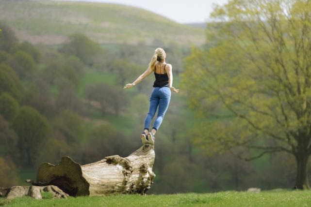 women top of a branch